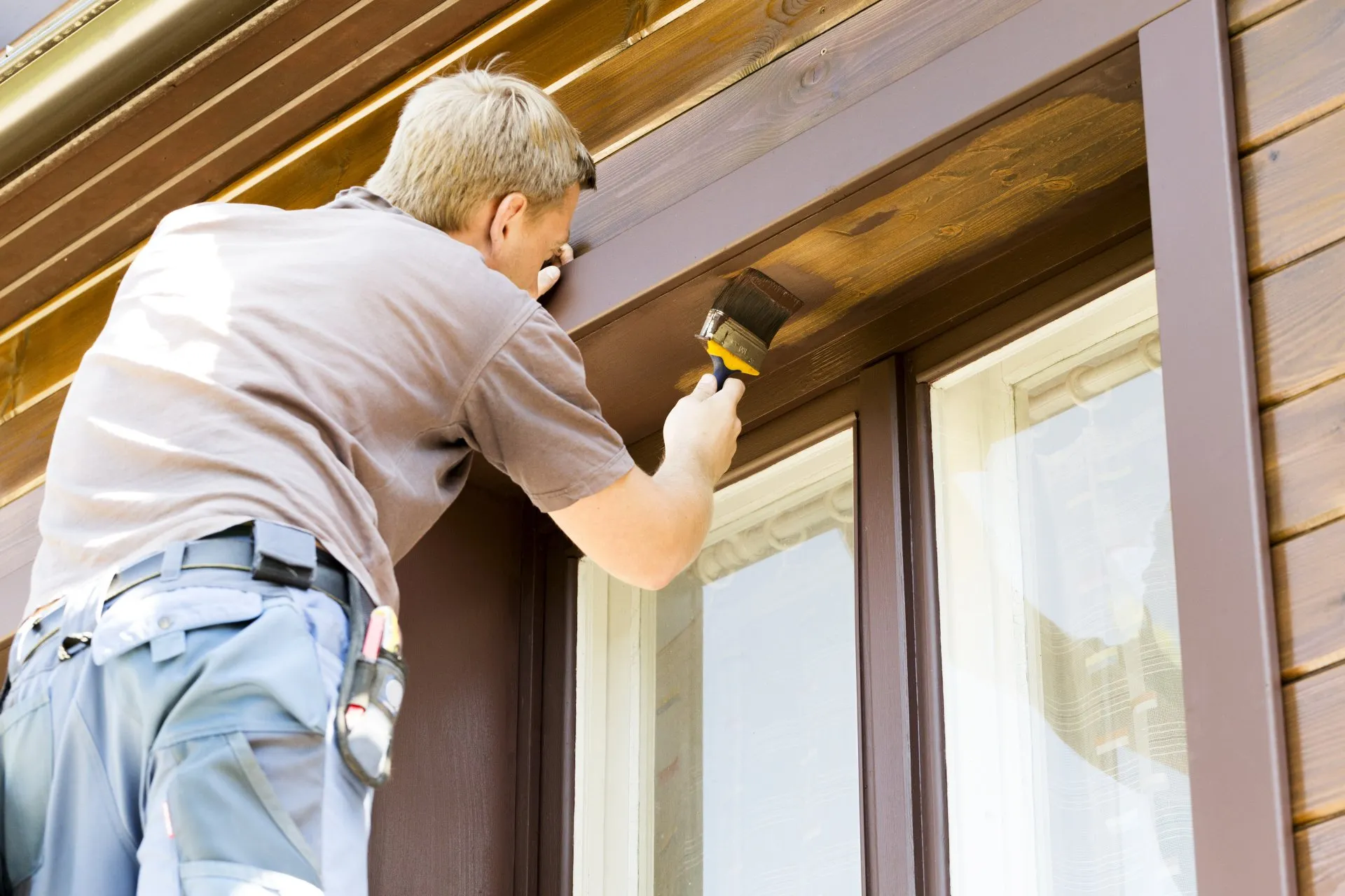Professional painting work on a home exterior